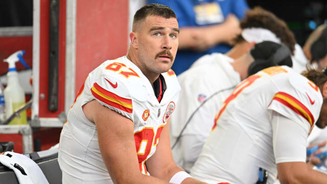 Oct 8, 2023; Minneapolis, Minnesota, USA; Kansas City Chiefs tight end Travis Kelce (87) looks on from the bench against the Minnesota Vikings during the second quarter at U.S. Bank Stadium. Mandatory Credit: Jeffrey Becker-USA TODAY Sports  